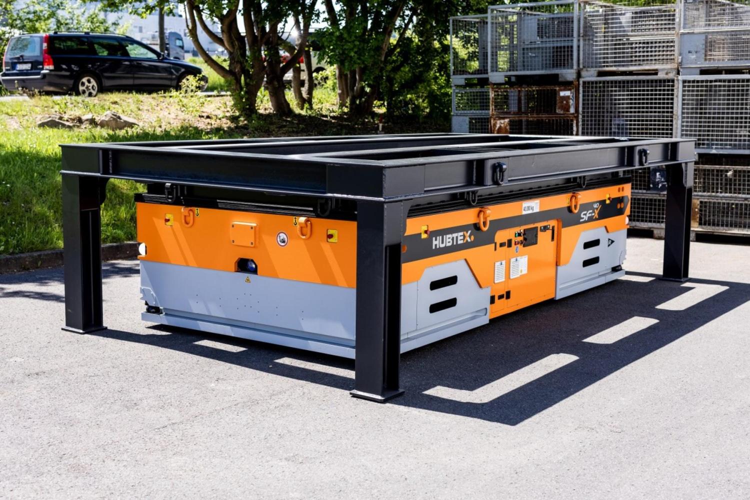 HUBTEX SFX platformwagen met transportframe voor industriële lading buiten